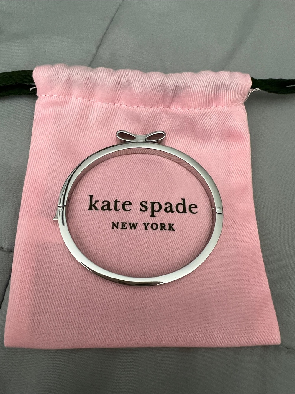 New kate Spade Silver Bracelet with pink pouch